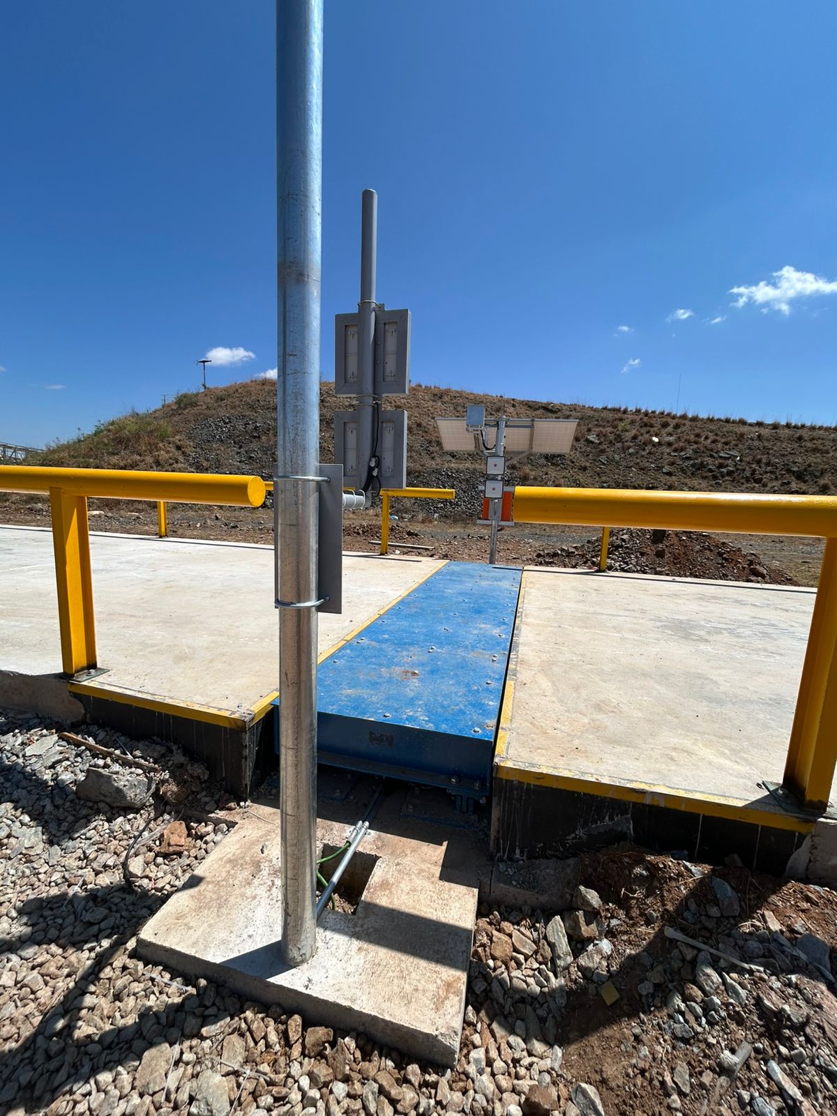 In-Motion Weighbridge installation showing truck passing over the scale at operating speed